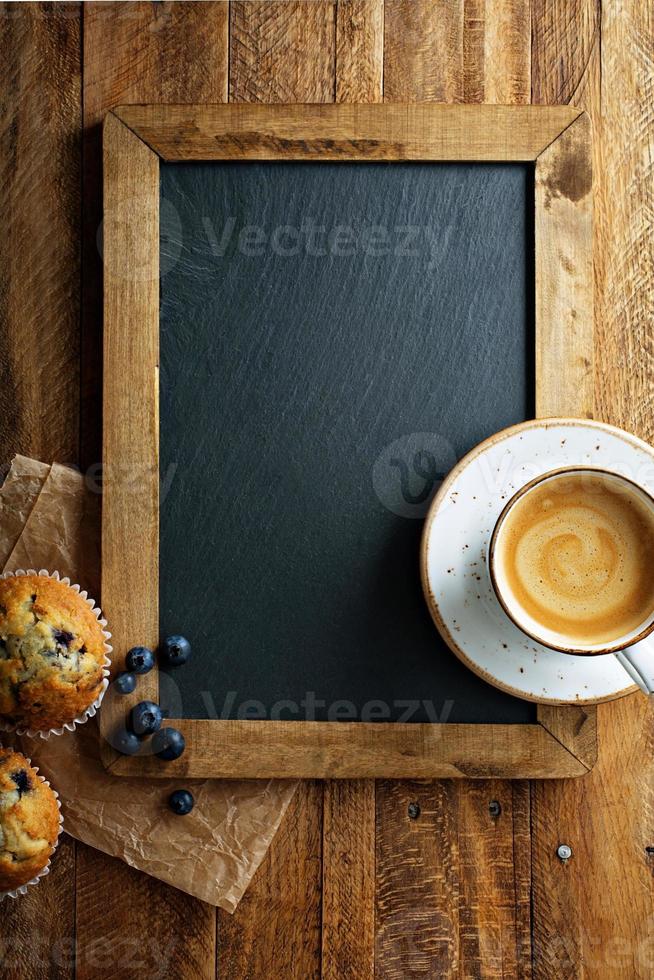 Freshly baked blueberry muffins in a rustic setting photo