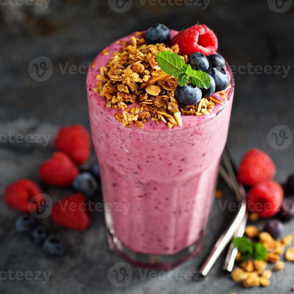 Berry smoothie in a tall glass photo