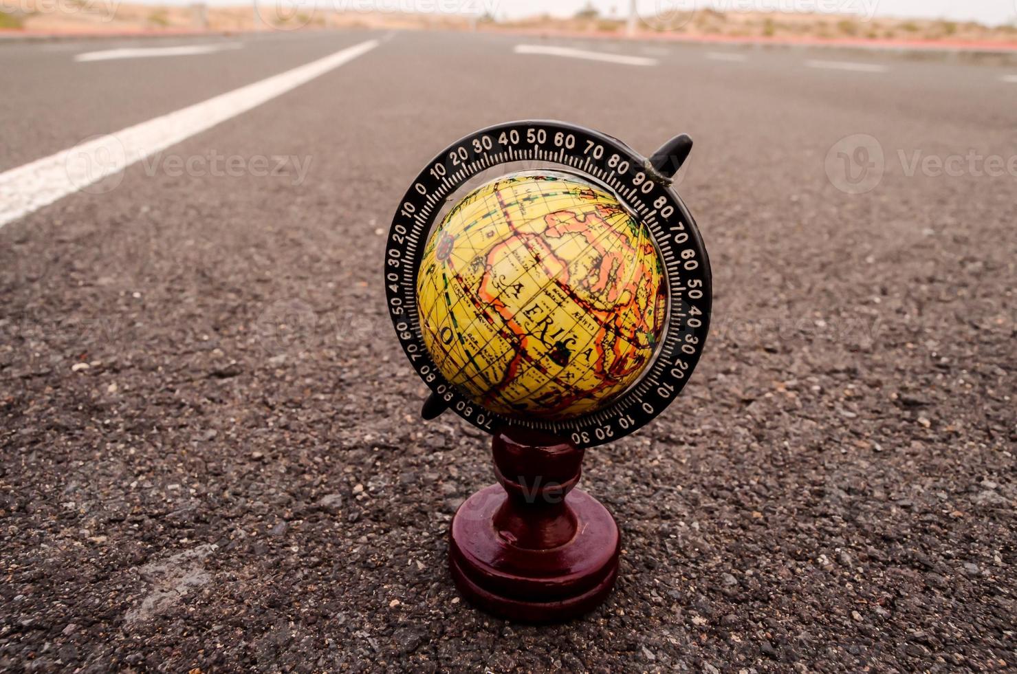 Globe on the ground photo