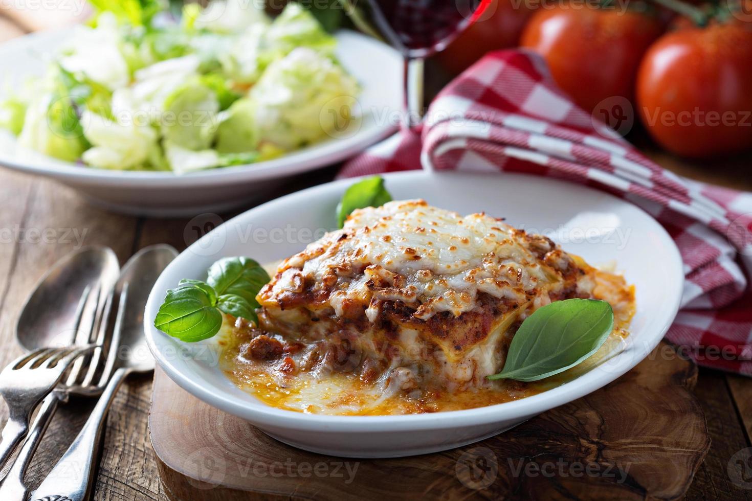 Traditional lasagna with bolognese sauce photo
