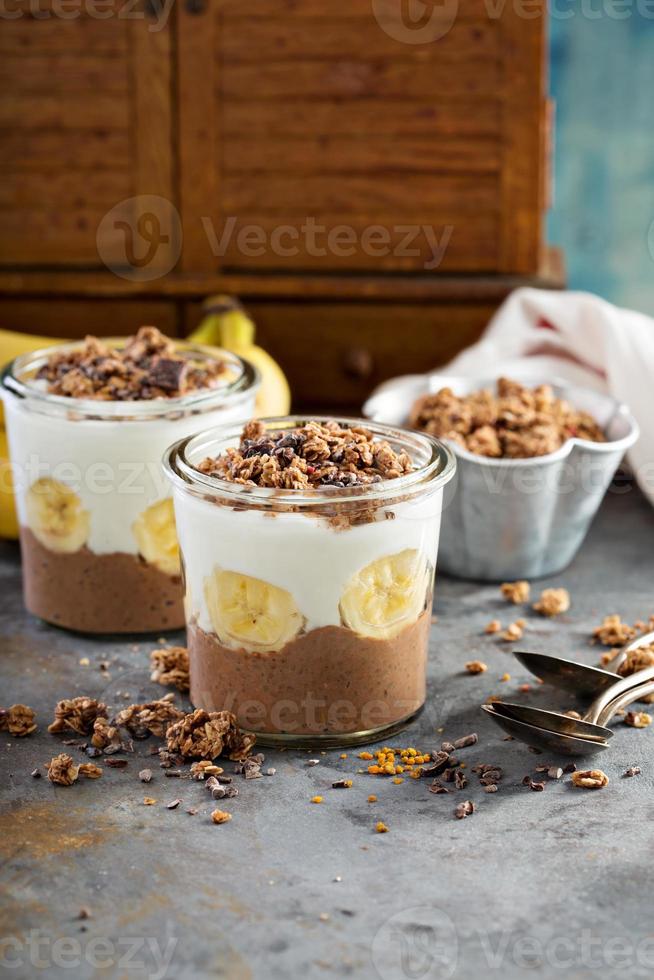 Chocolate chia pudding parfait with banana photo