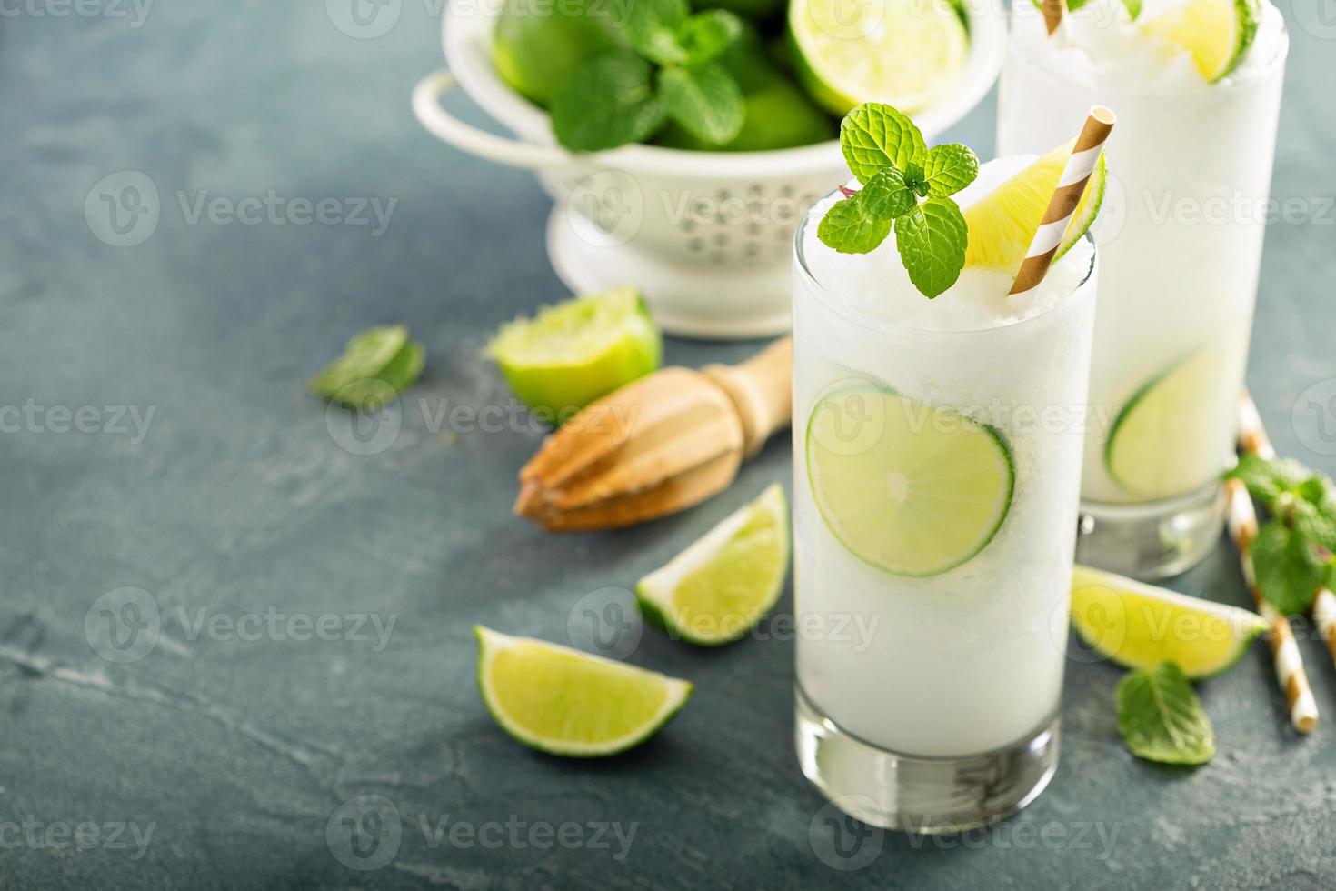 Refreshing lime frozen cooler or slushie photo