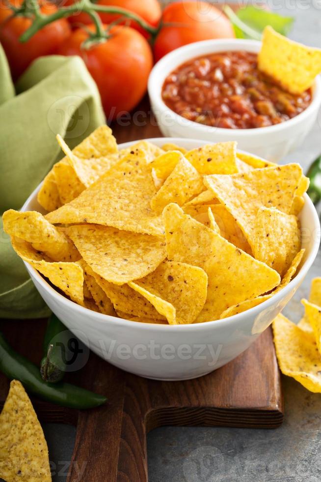 Corn tortilla chips in big bowl photo