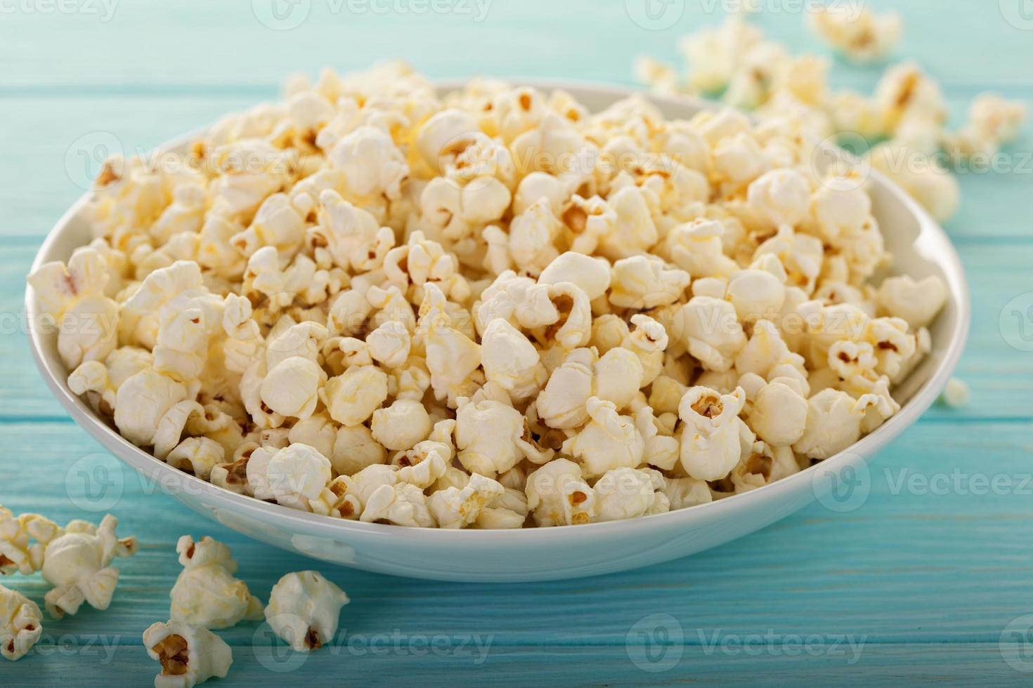 Cheddar cheese popcorn in a white bowl photo