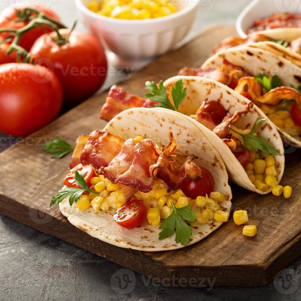 Breakfast tacos with scrambled eggs and bacon photo