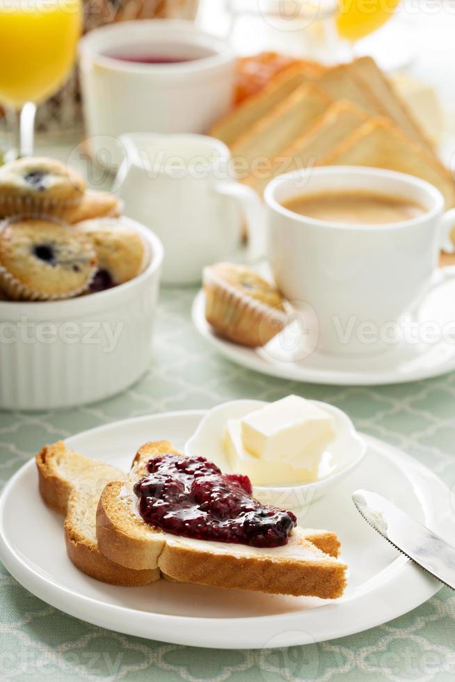 Fresh and bright continental breakfast table photo