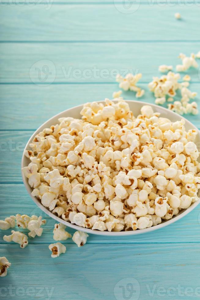 Cheddar cheese popcorn in a white bowl photo