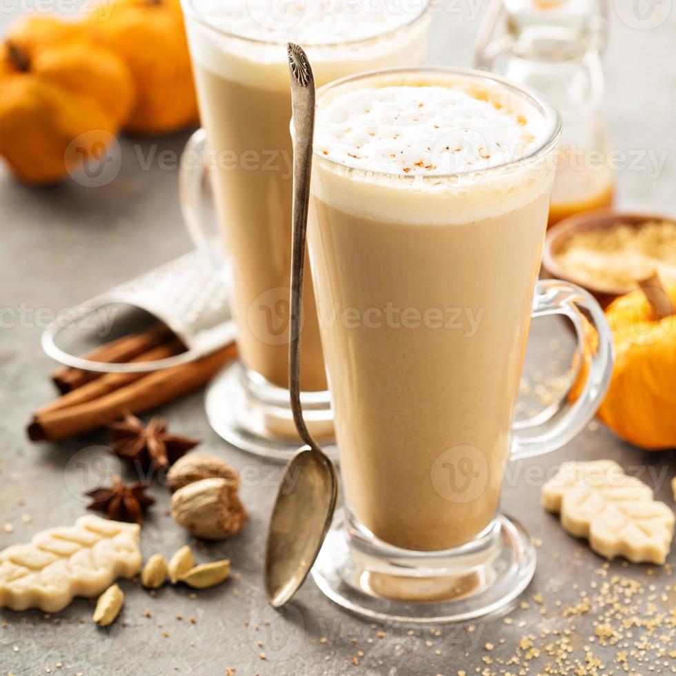 Pumpkin spice latte in tall mugs photo