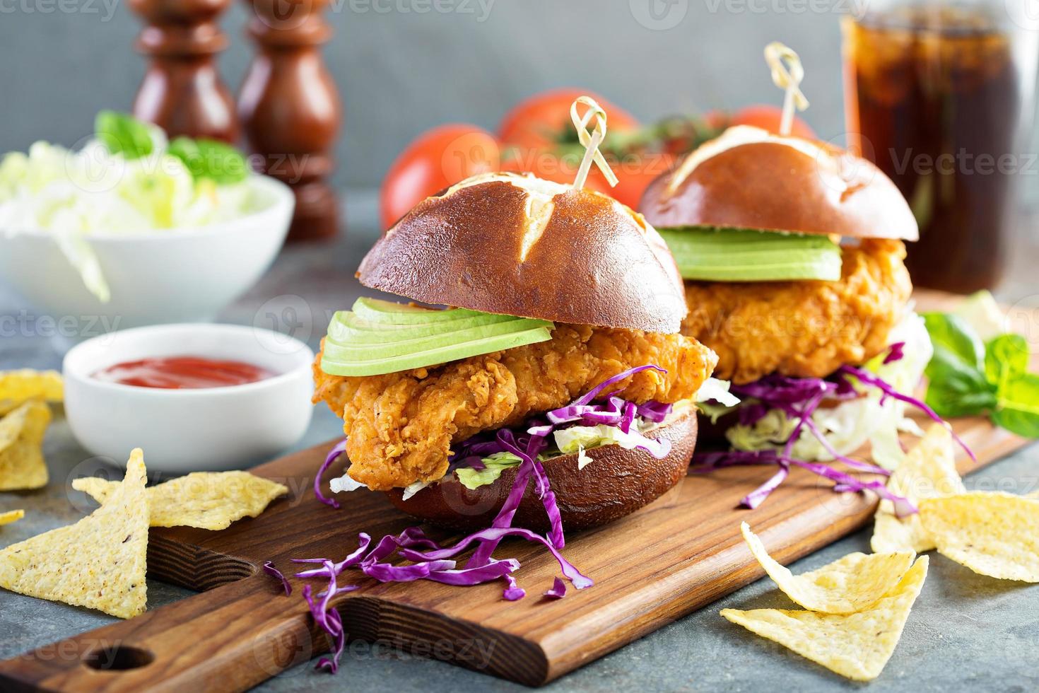 Chicken tender sandwich with avocado and slaw photo