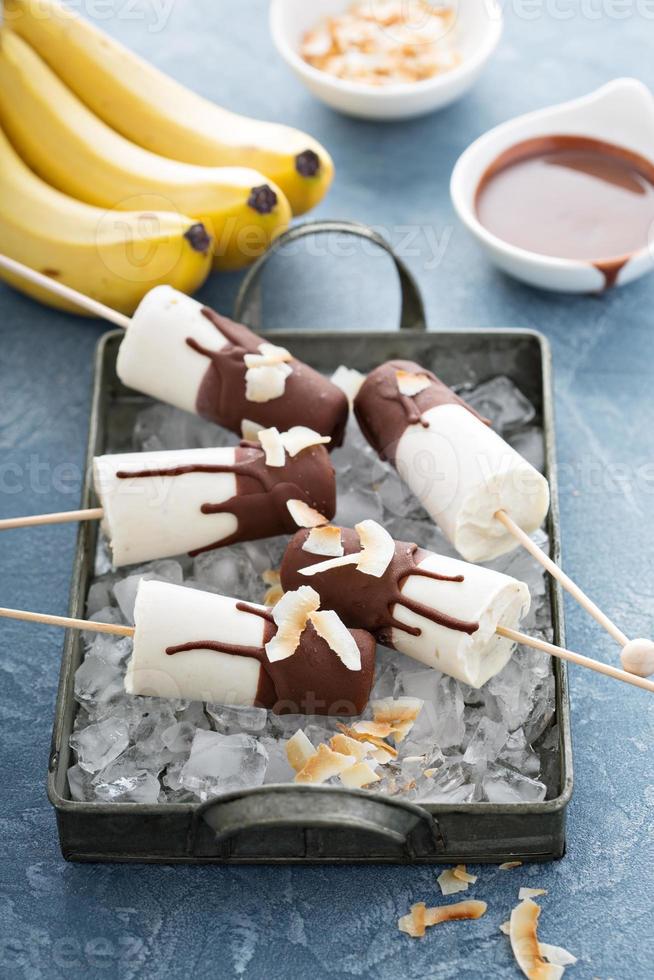 Banana and chocolate popsicles photo