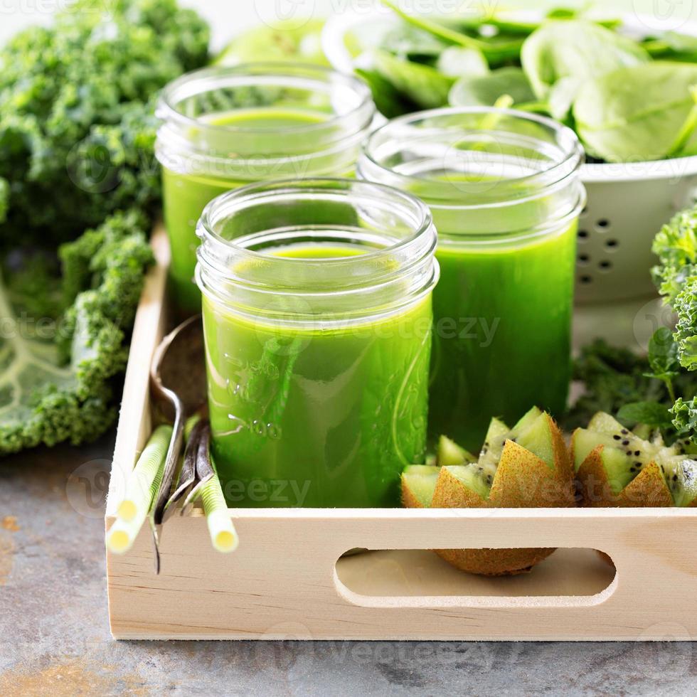 Green juice in mason jars photo