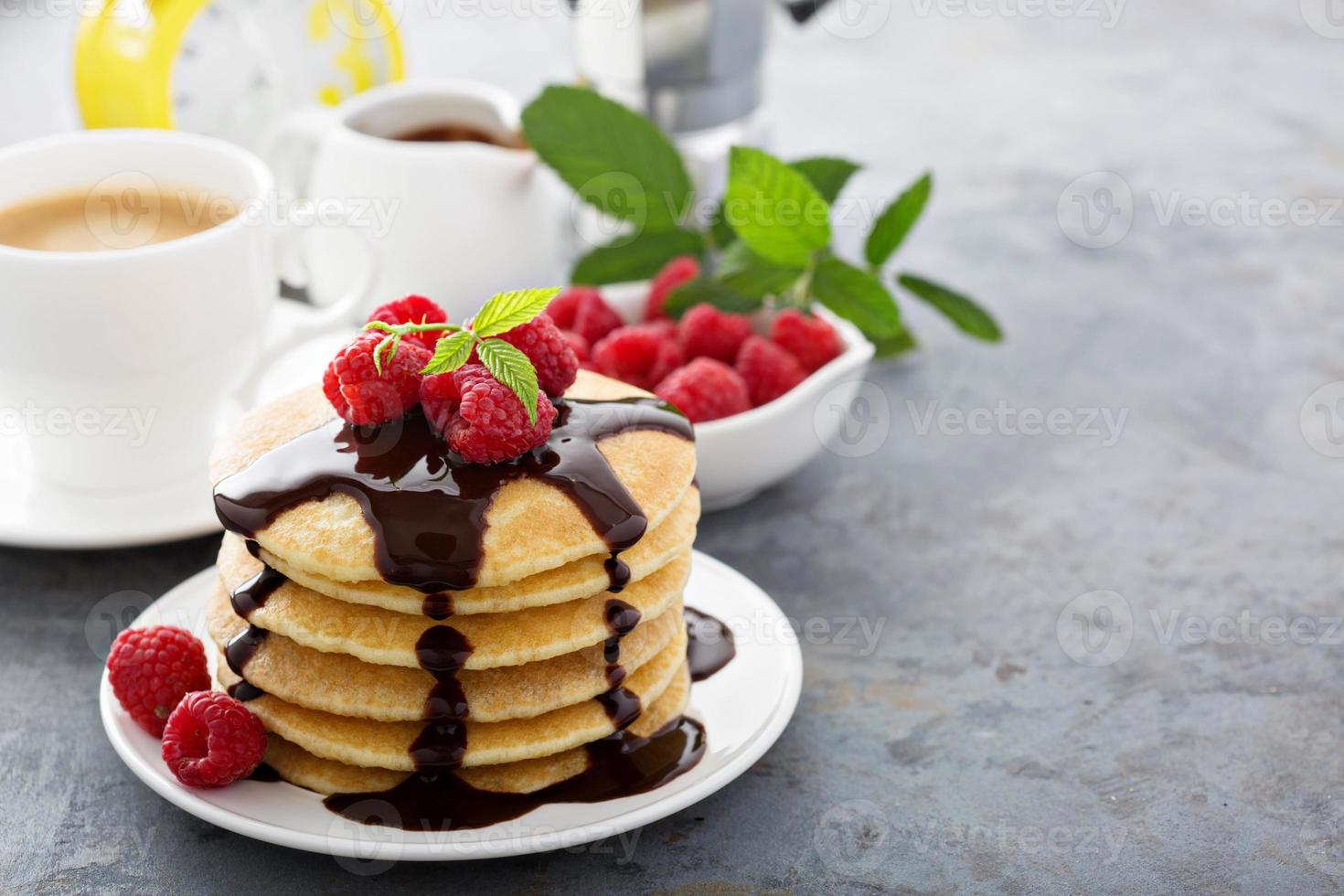 Stack of fluffy buttermilk pancakes with chocolate photo