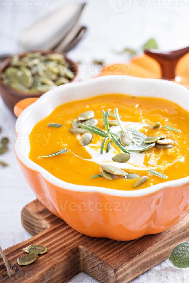 Pumpkin soup in a bowl photo