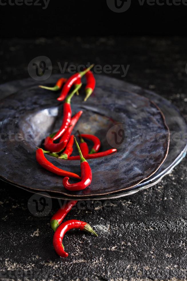 Red chili peppers in a cup photo