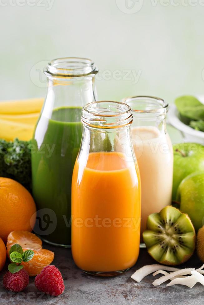 Variety of fresh vegetable and fruit juices photo