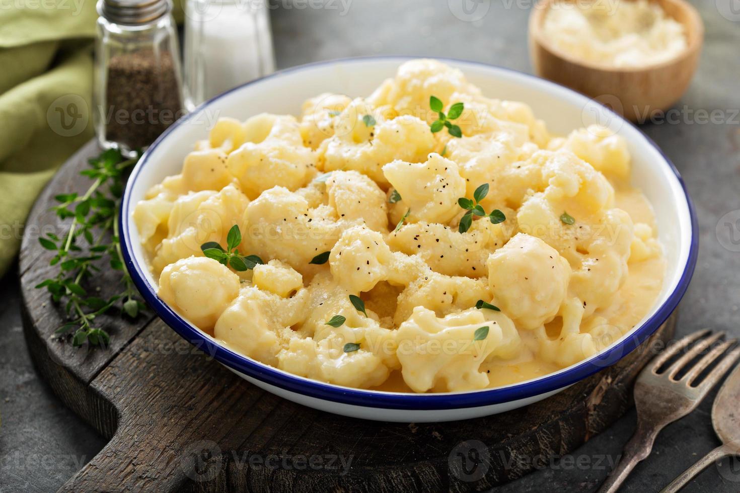 Cauliflower with cheese sauce photo