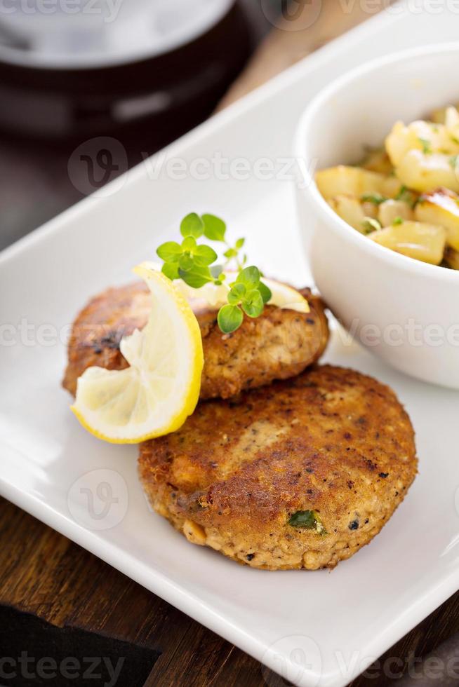 Crab cakes with potatoes 15760307 Stock Photo at Vecteezy