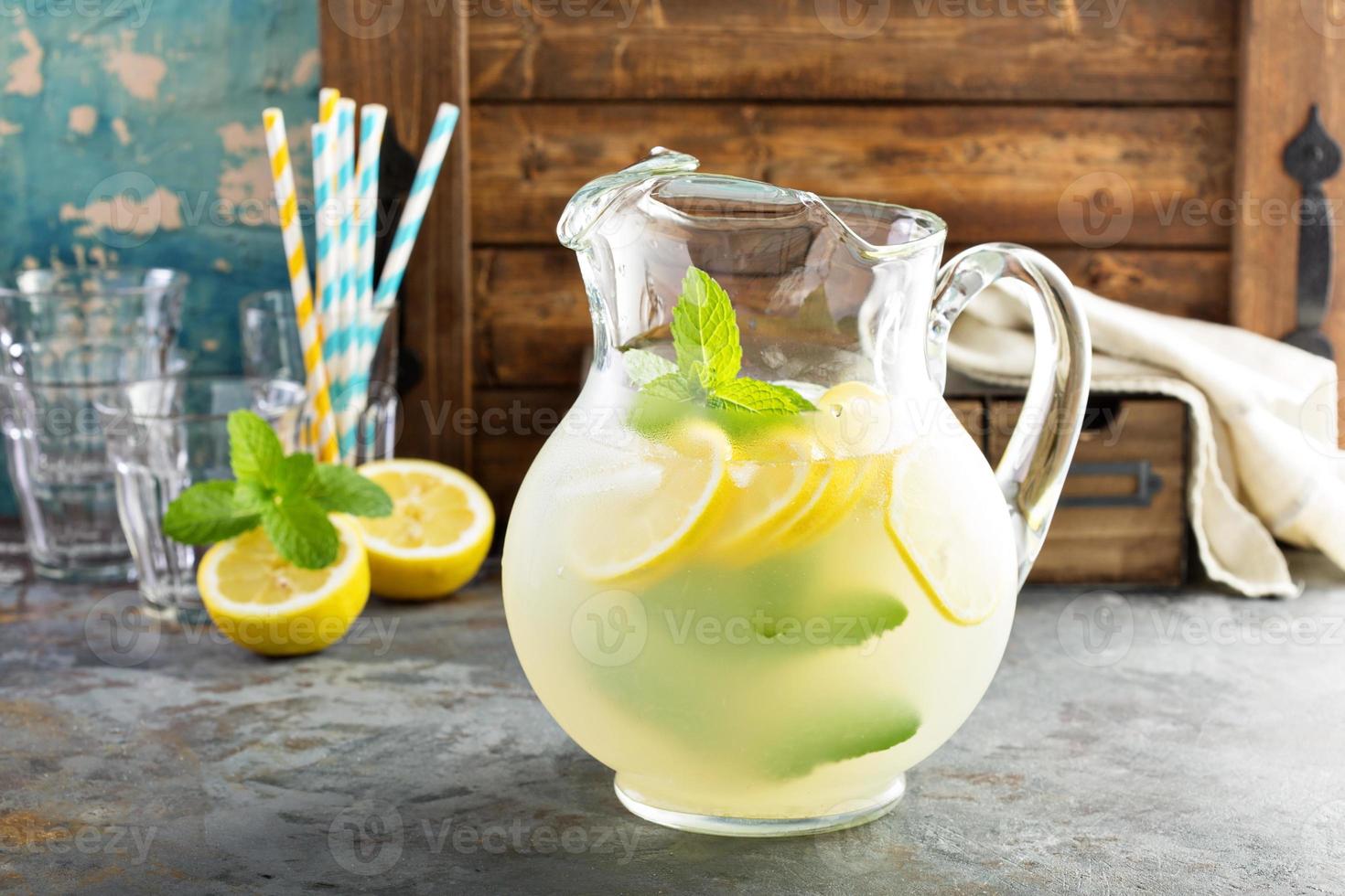 Traditional lemonade in a pitcher photo