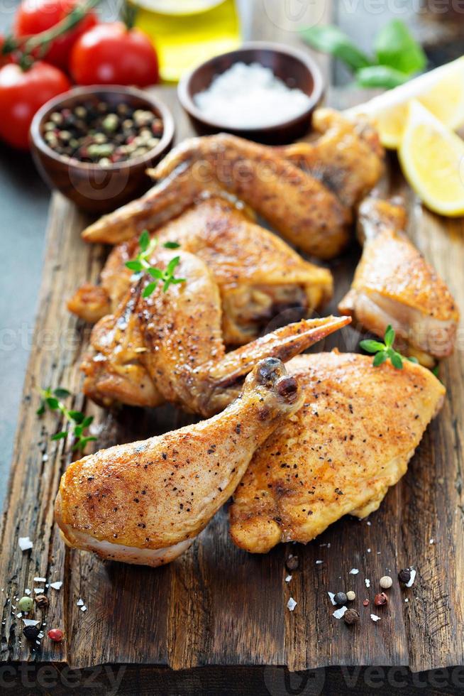 Pieces of grilled or smoked chicken photo