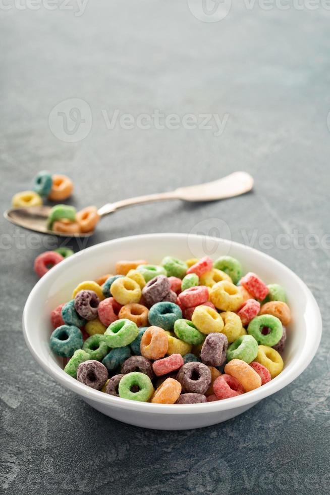 Fruit colorful sweet cereals in a bowl photo