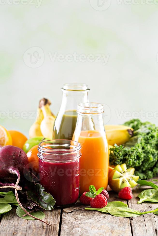 Variety of fresh vegetable and fruit juices photo