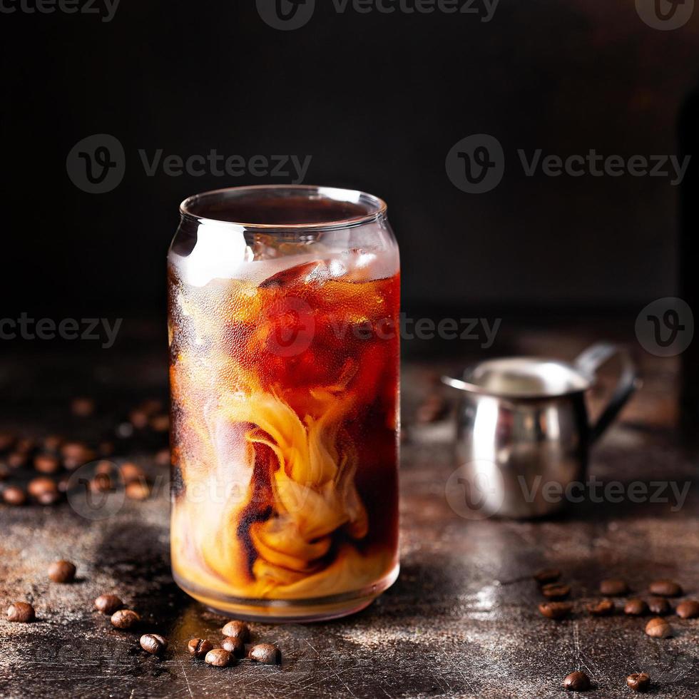 Cold brew iced coffee in glass bottles photo