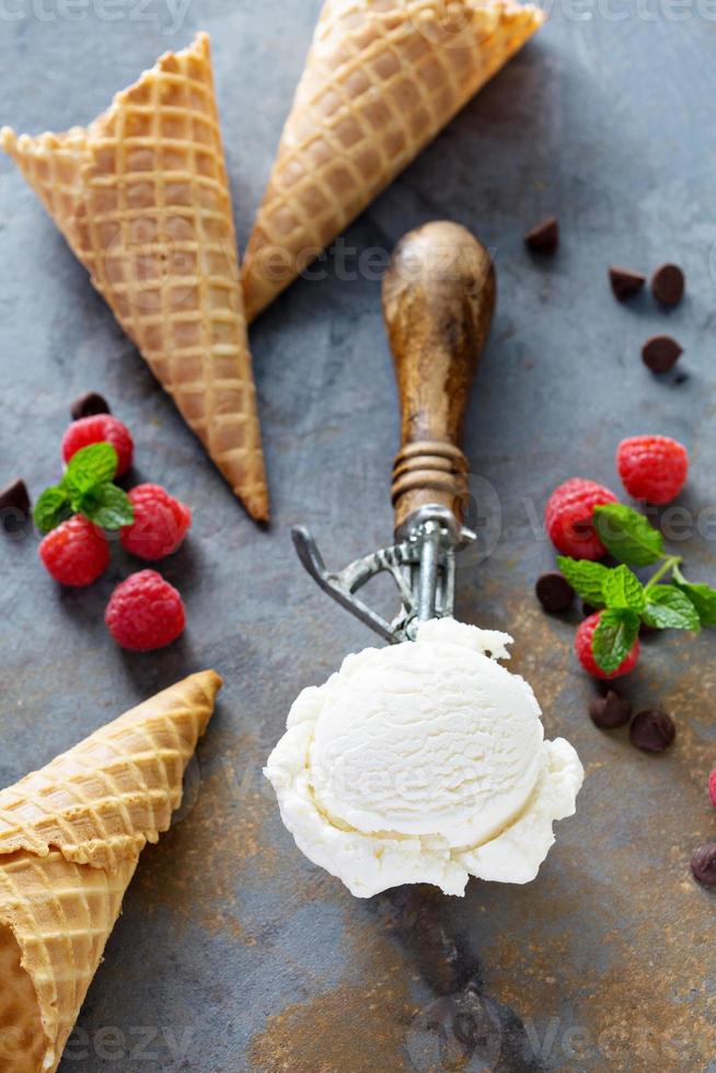 Vanilla ice cream scoop in a spoon photo