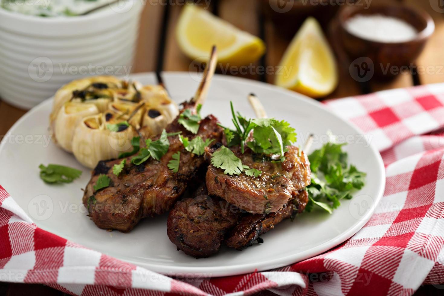 Lamb chops grilled with herbs photo