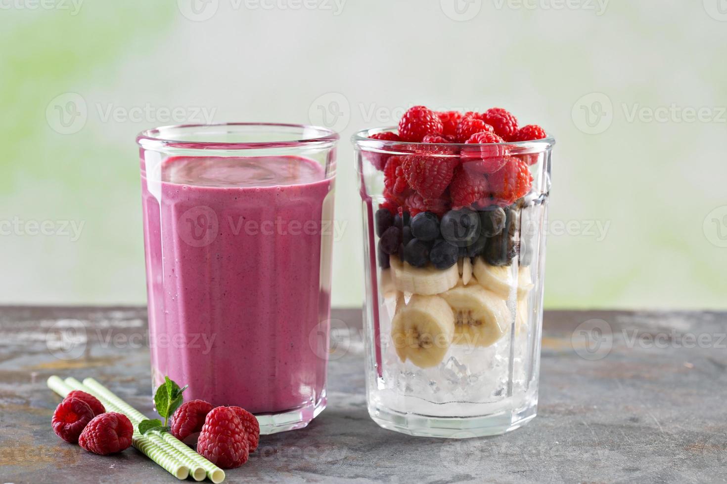 Berry smoothie ingredients in tall glass photo