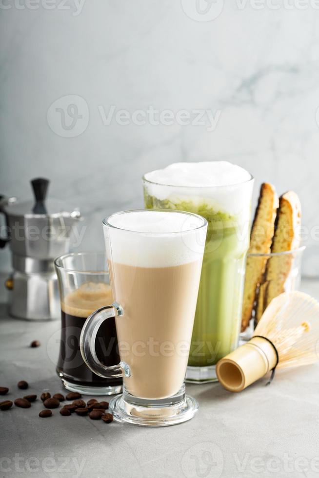 Espresso, regular coffee and matcha latte photo