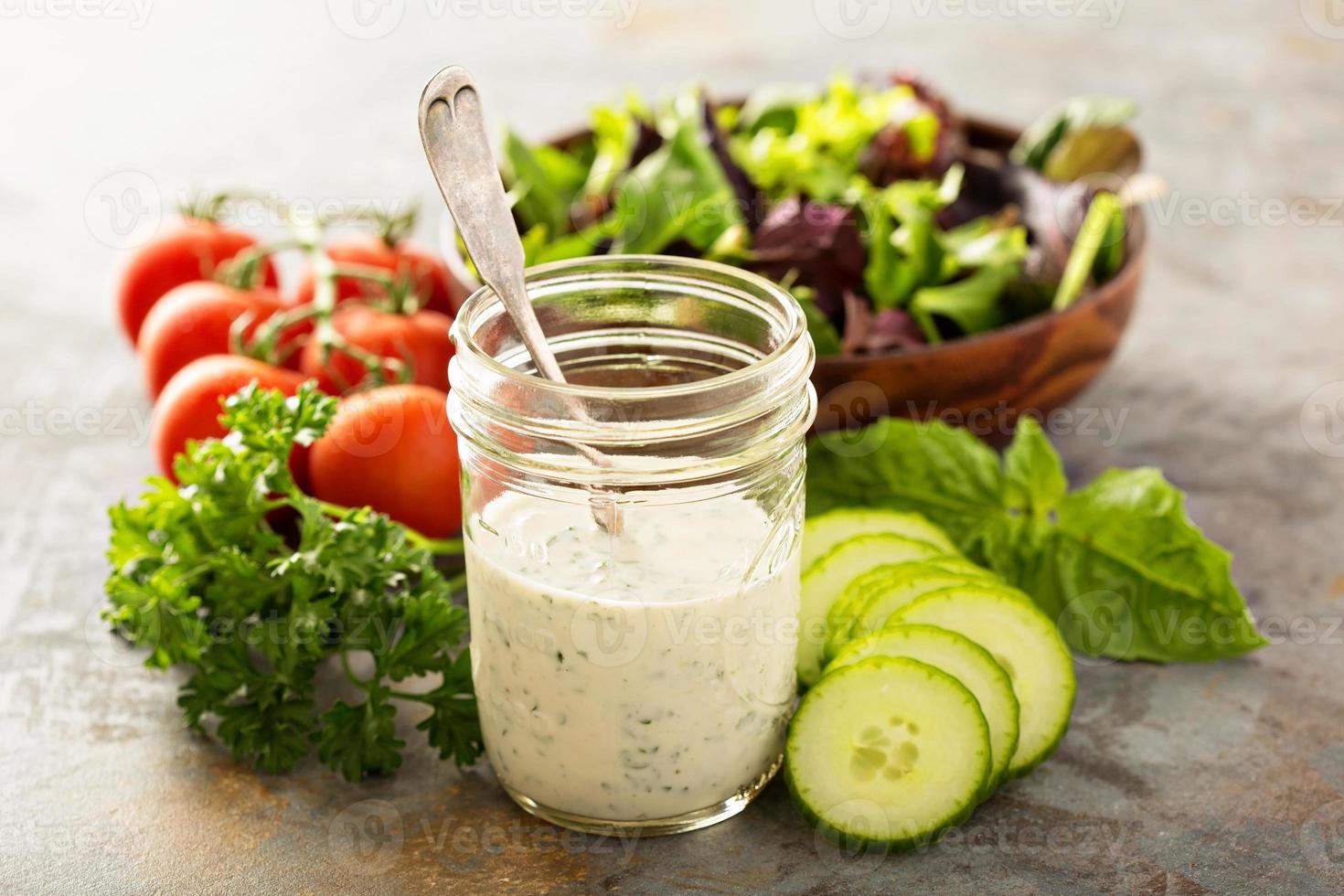 Homemade ranch dressing in a mason jar photo