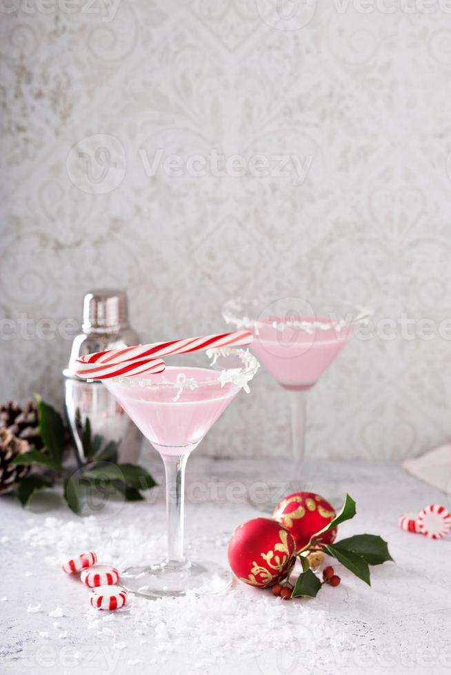 Peppermint martini cocktail with coconut flakes rim photo