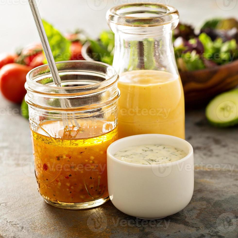Variety of sauces and salad dressings photo