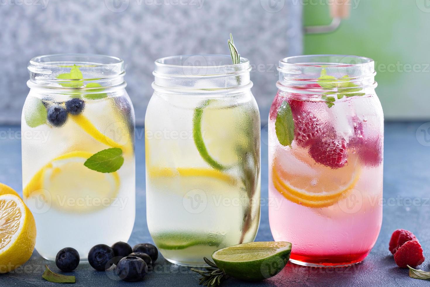 Variety of lemonade in jars photo