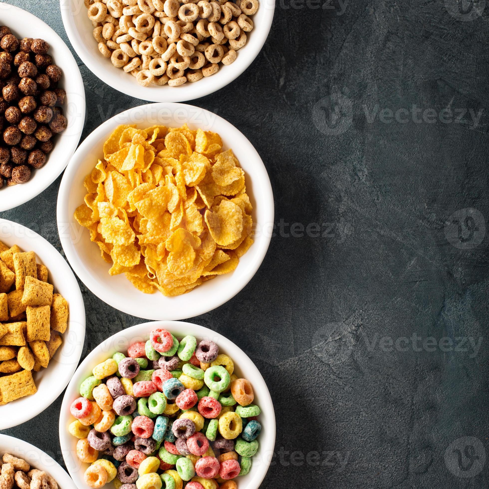 Variety of cold cereals in white bowls 15761668 Stock Photo at Vecteezy