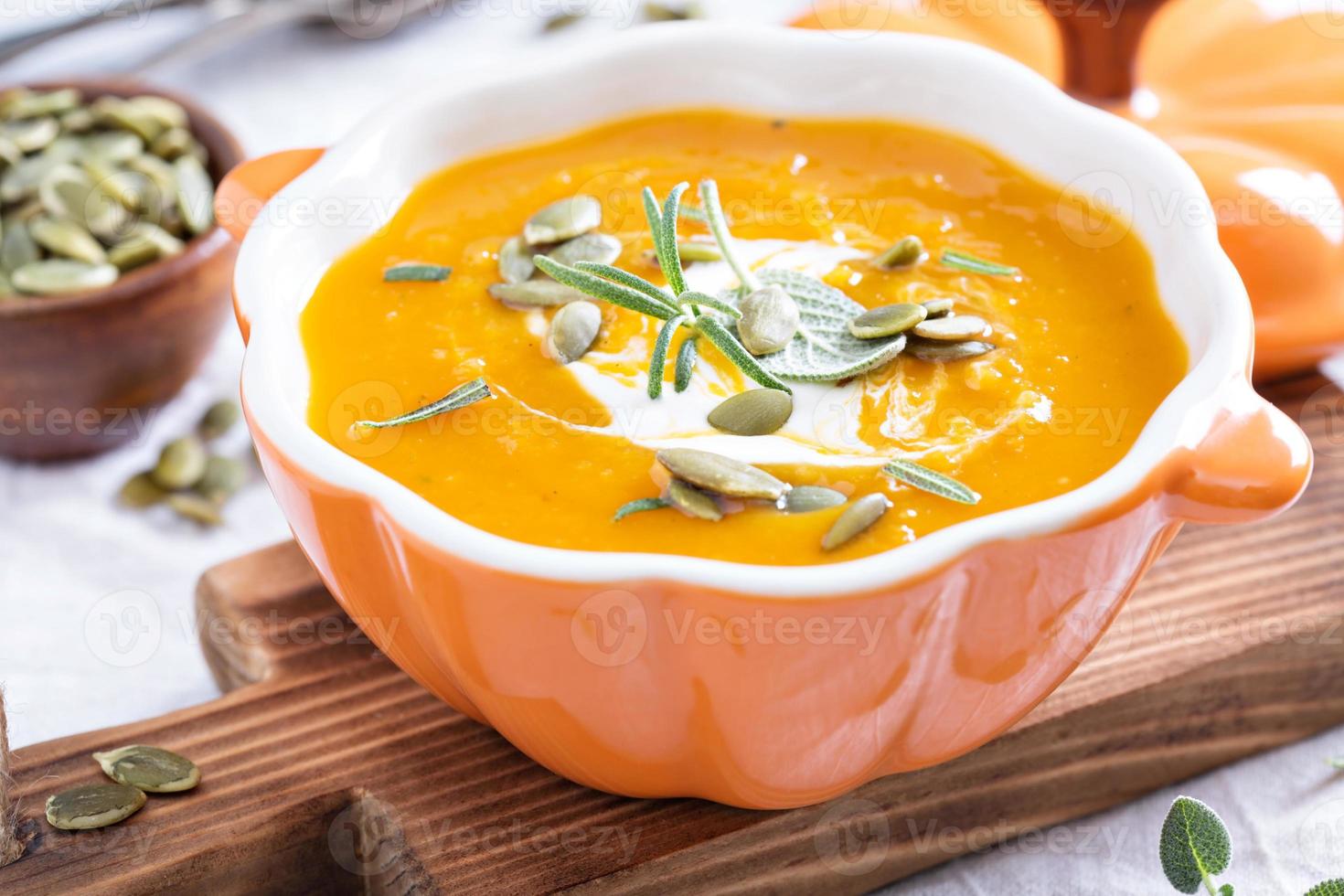 Pumpkin soup in a bowl photo