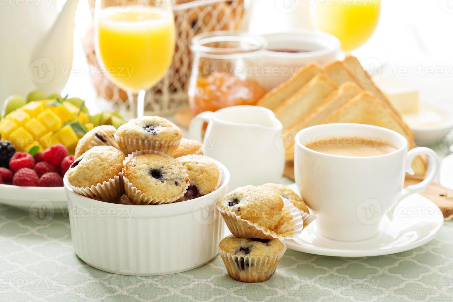 Fresh and bright continental breakfast table photo