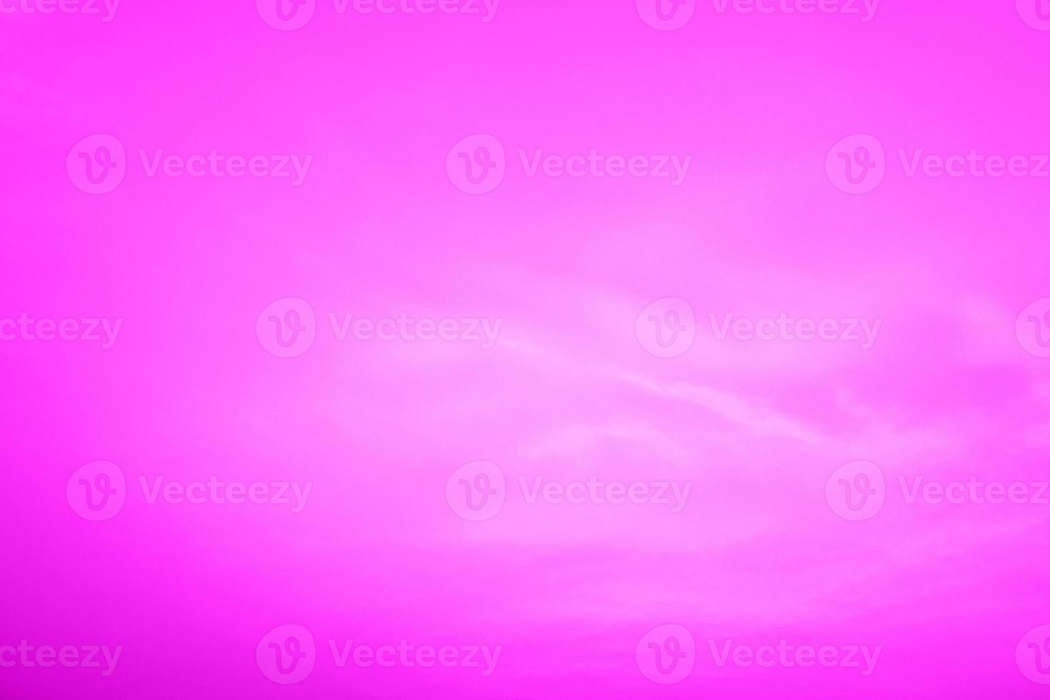 Defocus blurred transparent purple colored clear calm water surface texture with splashes and bubbles. Trendy abstract nature background. Water waves in sunlight with copy space. Pink water drop shine photo