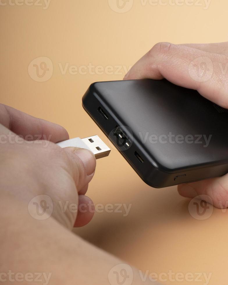 hand connect usb for black portable power bank charger photo