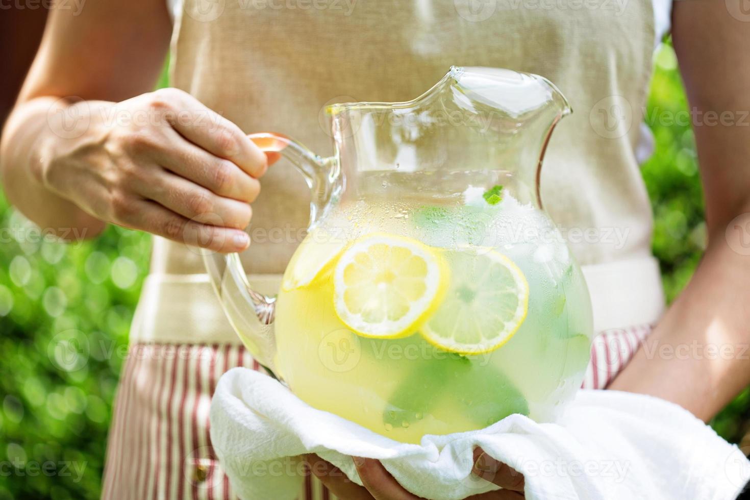 Traditional lemonade in a pitcher photo