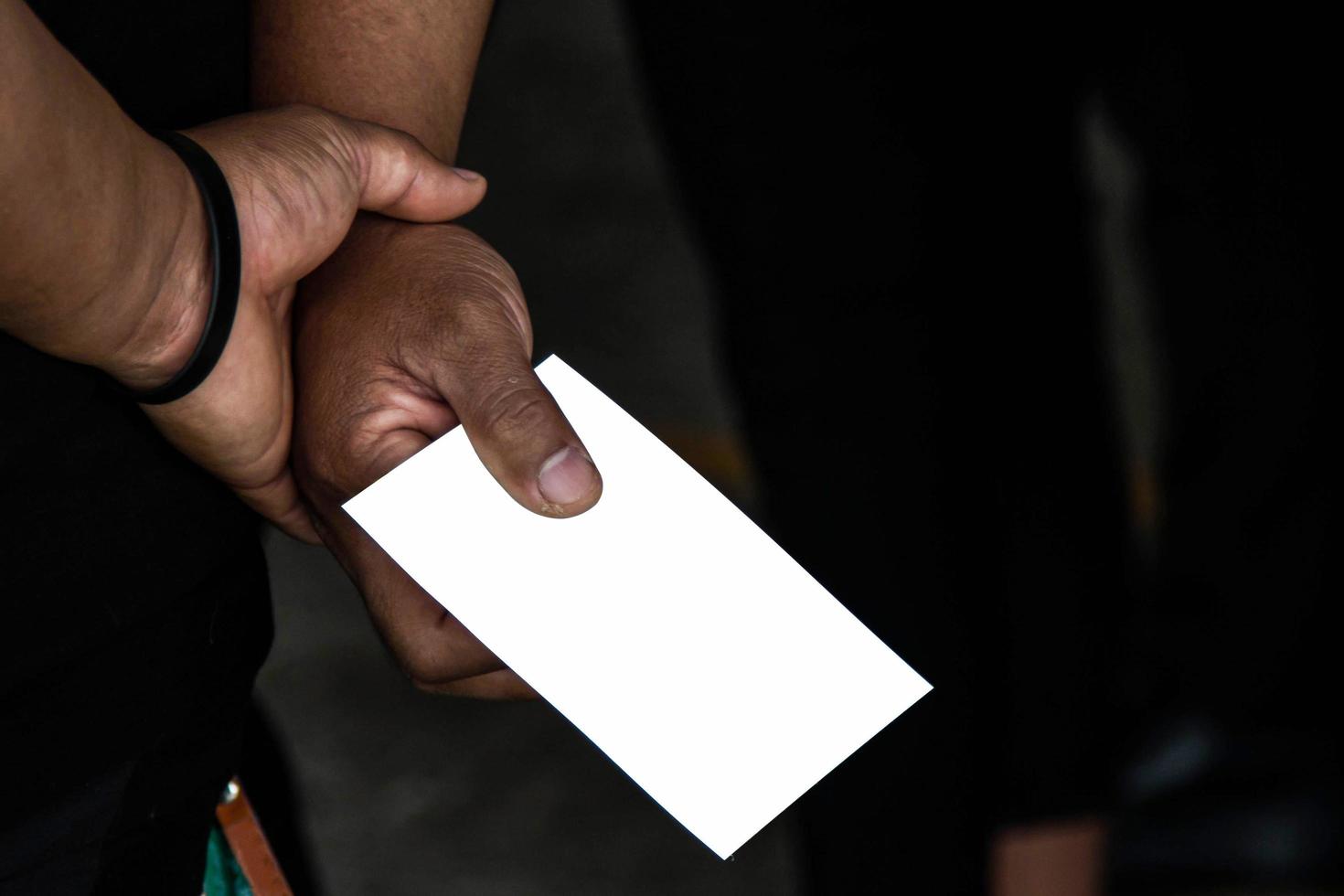 A man with a hand at a postcard with clipping path postcard photo