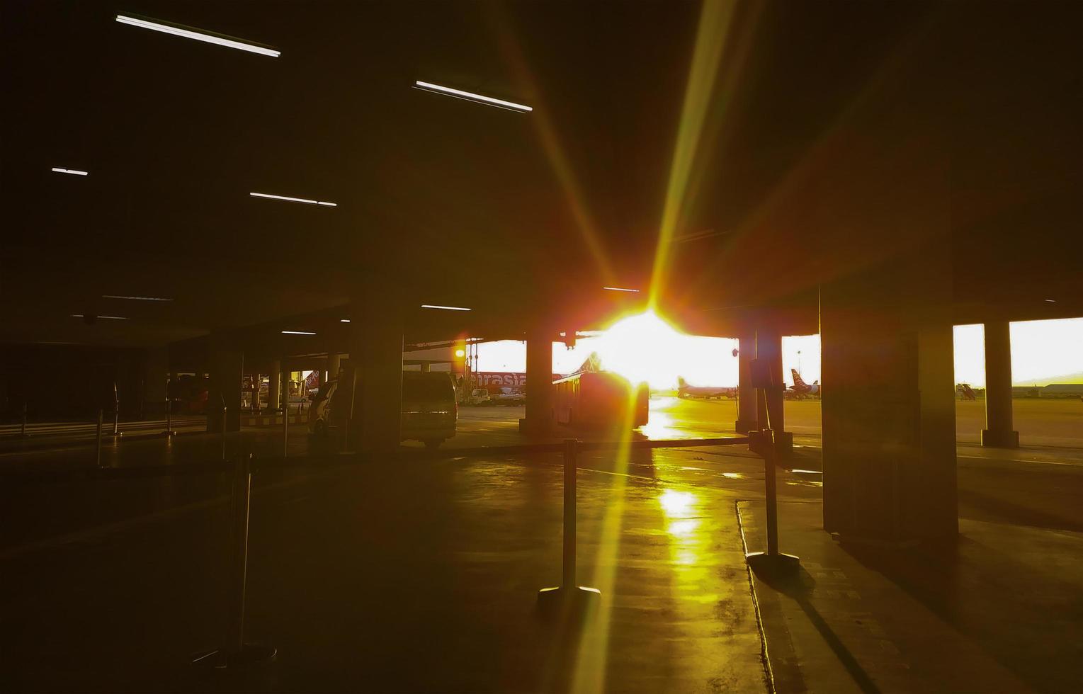 BANGKOK, THAILAND- JULY 19, 2019 Bangkok International Airport Don Muang Air Asia airlines aircrafts were ready on their bays in Don Muang airport, Bangkok,Thailand. JULY 19, 2019. photo