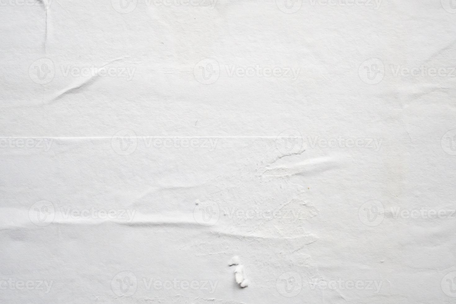 fondo de textura de cartel de papel arrugado y arrugado blanco foto