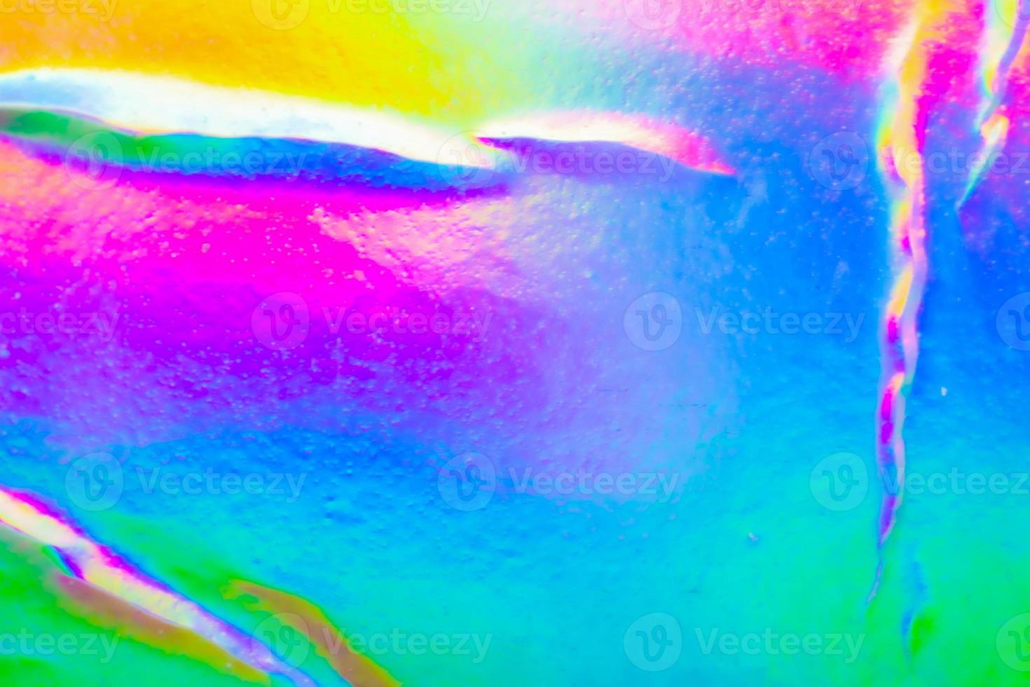 Crumpled Holographic rainbow foil iridescent texture abstract hologram background photo