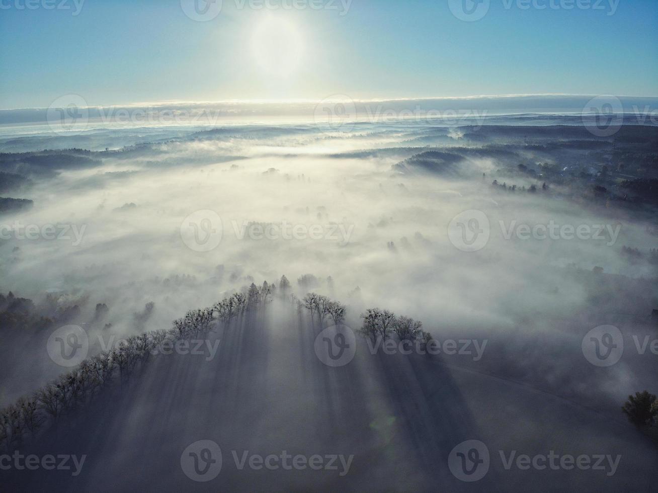 Top view aerial shot of foggy Polish village photo