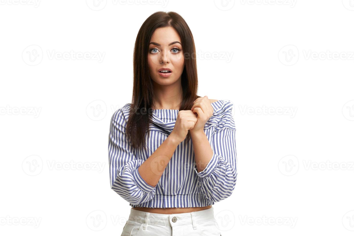 Caucasian brunette woman having fun and smiling isolated over white background photo
