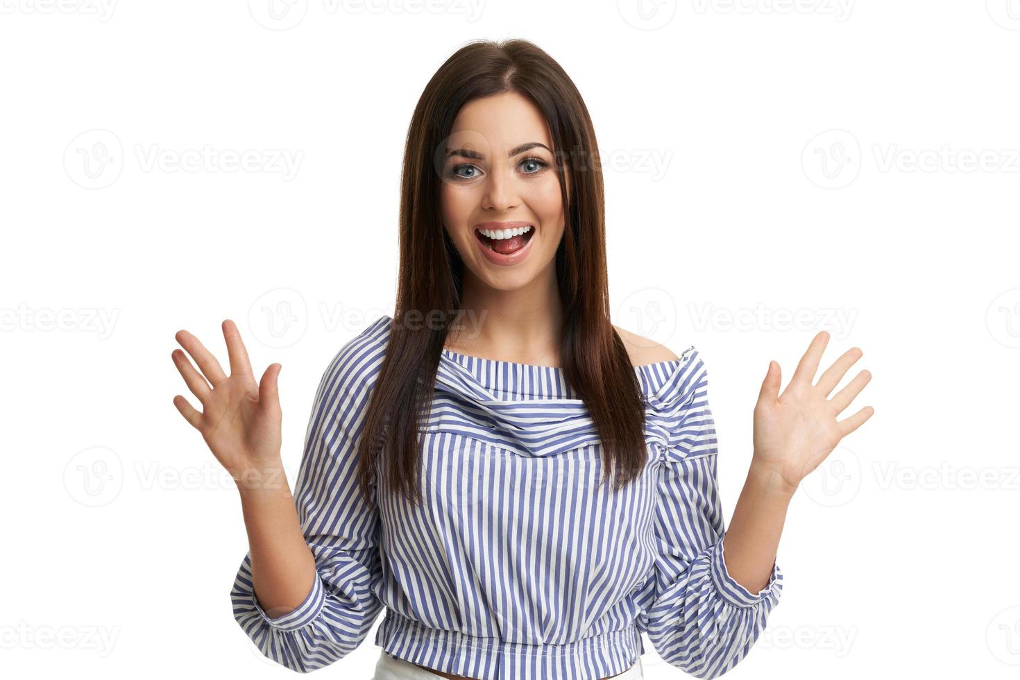 Caucasian brunette woman having fun and smiling isolated over white background photo