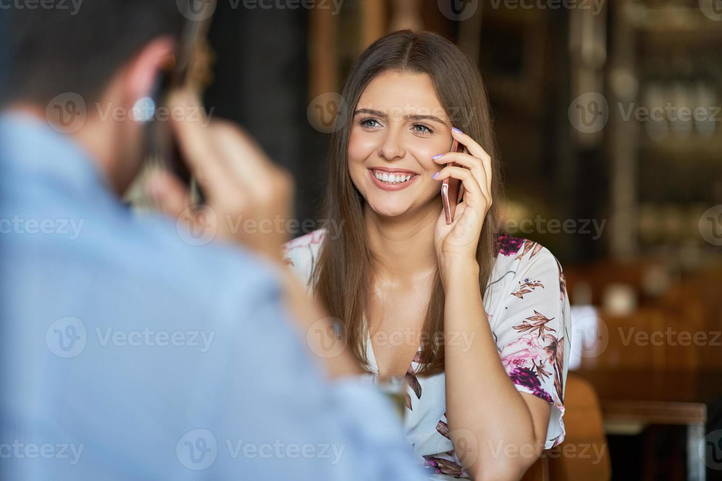 Romantic couple dating in restaurant photo