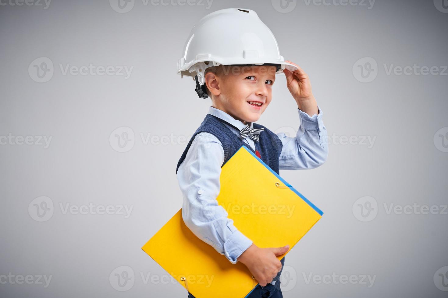 Portrait of a 4 year old boy posing over white photo