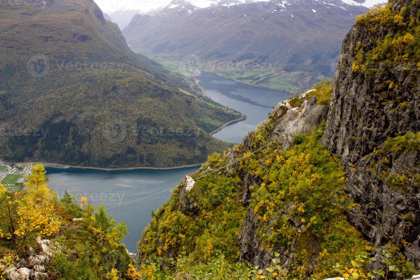 Beautiful side view on the top of via ferrata Loen Norway with suspension bridge in autumn,scandinavian nature,outdoor activity,norwegian lifestyle,print for poster,cover,calendar photo